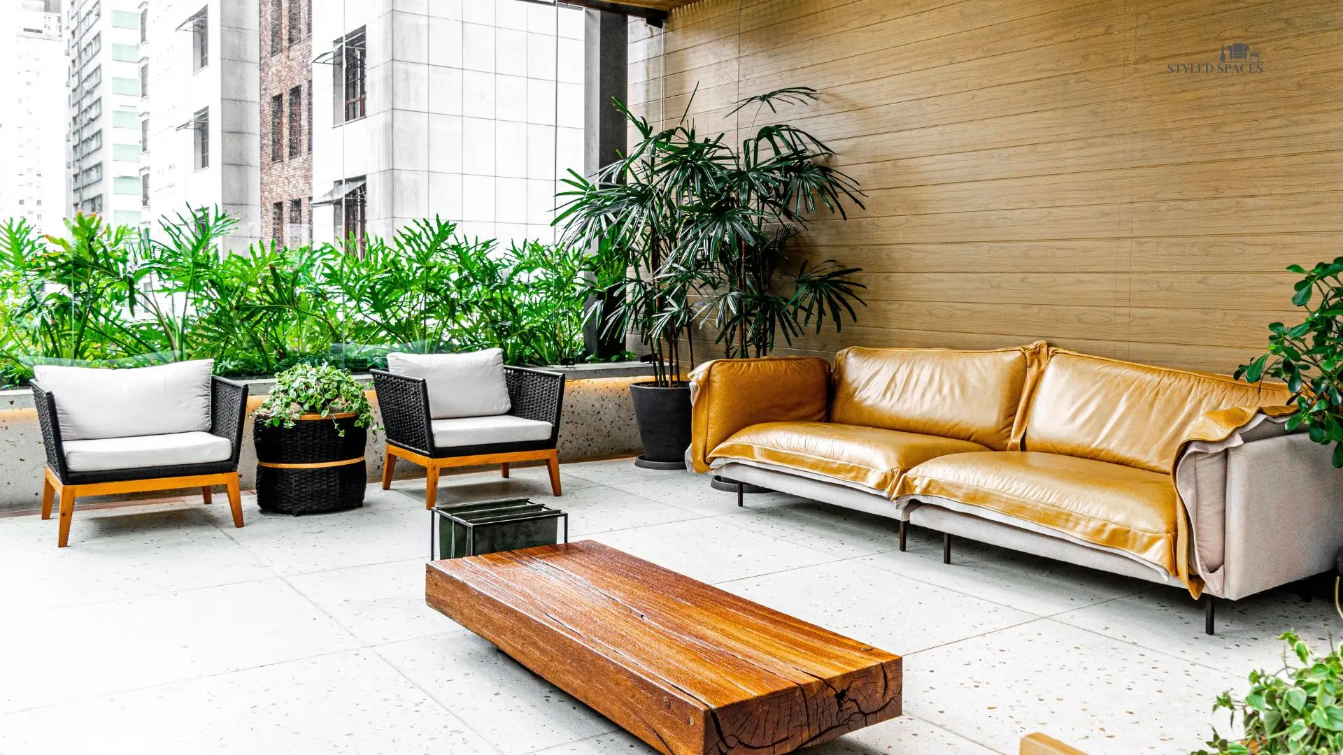 Backyard patio styled as an outdoor living room