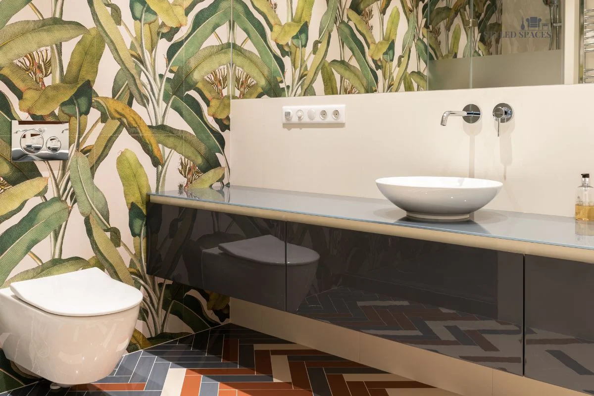 Small powder room styled with a bold, saturated color