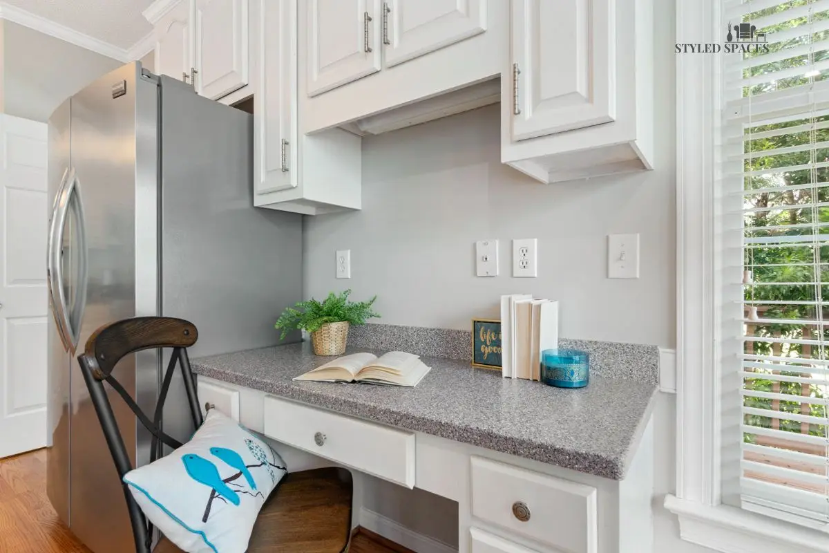 Built-in kitchen workstation with a low-profile desk on the island