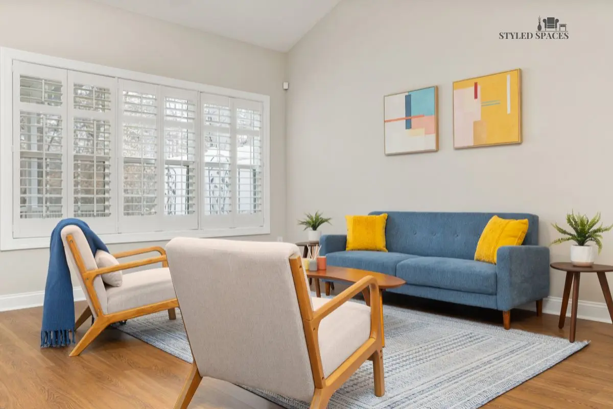 Neutral living room warmed up with a bold accent and textured layers