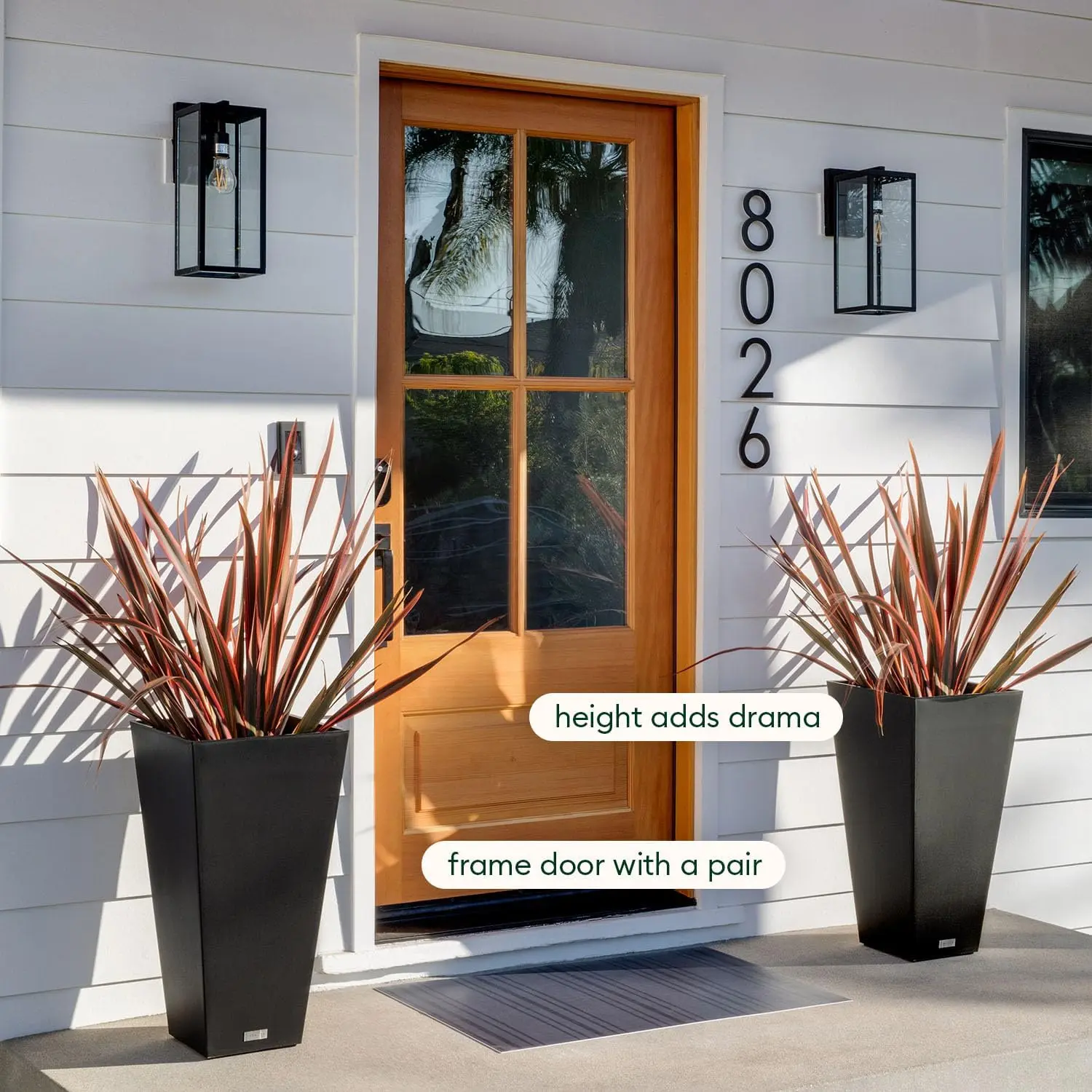 Veradek Pure Series tall tapered black planters flanking a front door